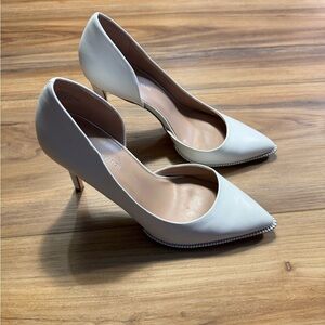 BCBGeneration Brand Cream Pointed-Toe Pumps with Crystal Outsole Accent